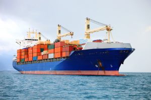 cargo container ship in mediterranean coast
